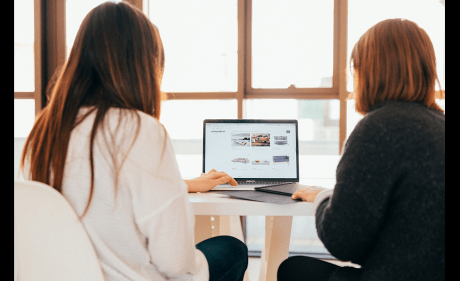 Campaign managers for nonprofit organization using text to donate solutions on a shared laptop