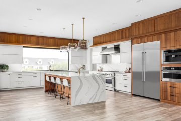 Stylish kitchen with wood cabinets and sleek countertops.