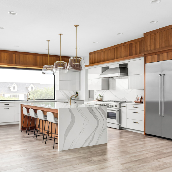 Stylish kitchen with wood cabinets and sleek countertops.